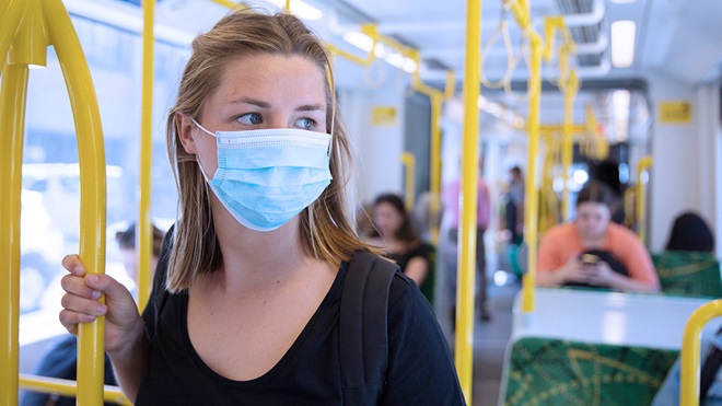 person_on_a_tram_with_face_mask